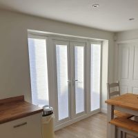 patio door blinds in a kitchen diner