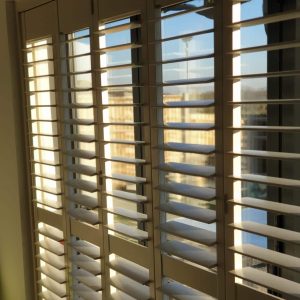 Plantation shutters close up tilted open
