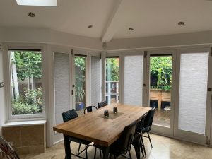 perfect fit pleated blinds on large windows in dining room