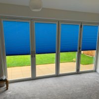 bright blue bi-fold door blinds