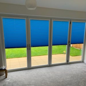 bright blue bi-fold door blinds