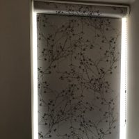 grey patterned closed roller blind