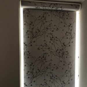 grey patterned closed roller blind