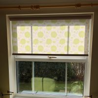 roller blinds with green floral pattern