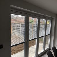 bi-fold door blinds, Venetian blinds half closed