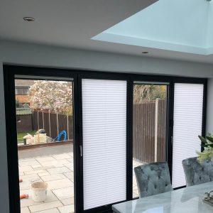 bifold door blinds, one open, one closed