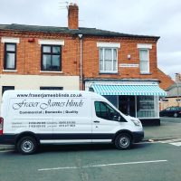 commercial awning over bakery shop front with Fraser James Blinds van