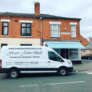 commercial awning over bakery shop front with Fraser James Blinds van