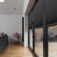 grey, pleated bi fold door blinds