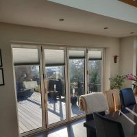 pleated blinds on bi-fold doors