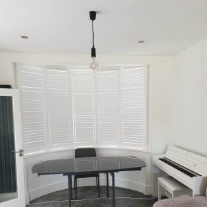 White plantation shutters closed