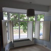 open cafe style shutters