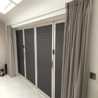 dark grey duette blinds on patio doors