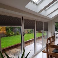grey bi-fold door blinds
