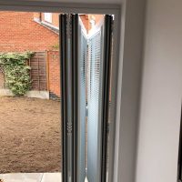 Venetian blinds on bi-fold doors