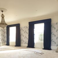 full length navy blue curtains in bedroom