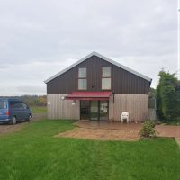 Bespoke branded awning for shop in Brackley, Northamptonshire by Fraser James Blinds