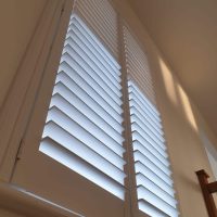 Closeup white shutters by Fraser James Blinds in Northampton