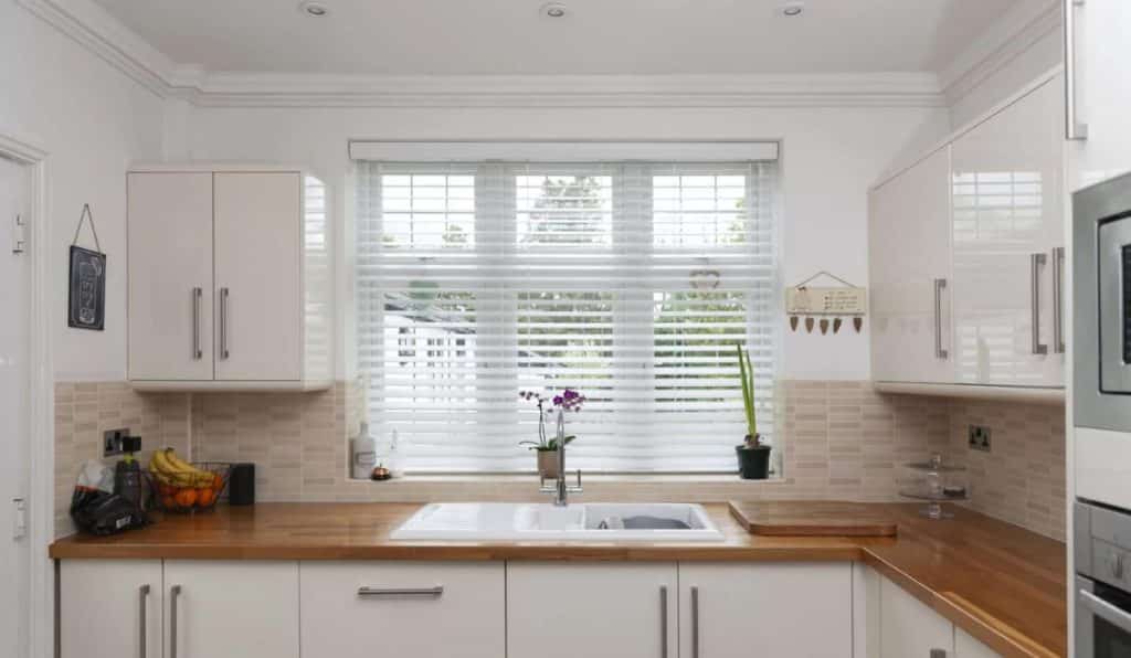 Faux wood blinds in a kitchen